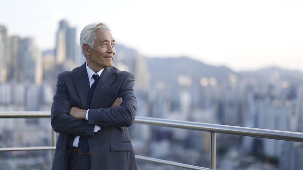 Businessman looking into the distance after reading Northwestern Mutual Market Commentary