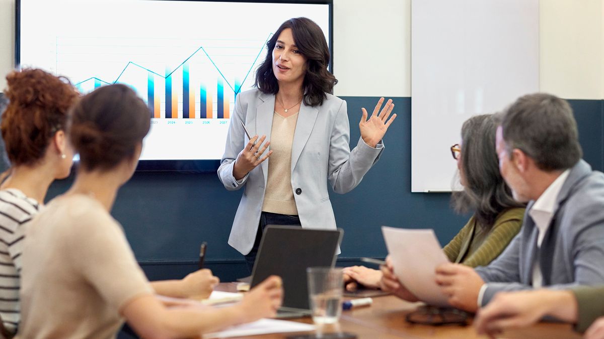 Woman who will be getting a promotion giving a presentation 