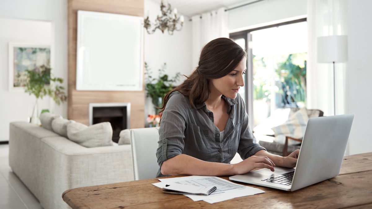 Woman reading about Fixed Income on Northwestern Mutual's website