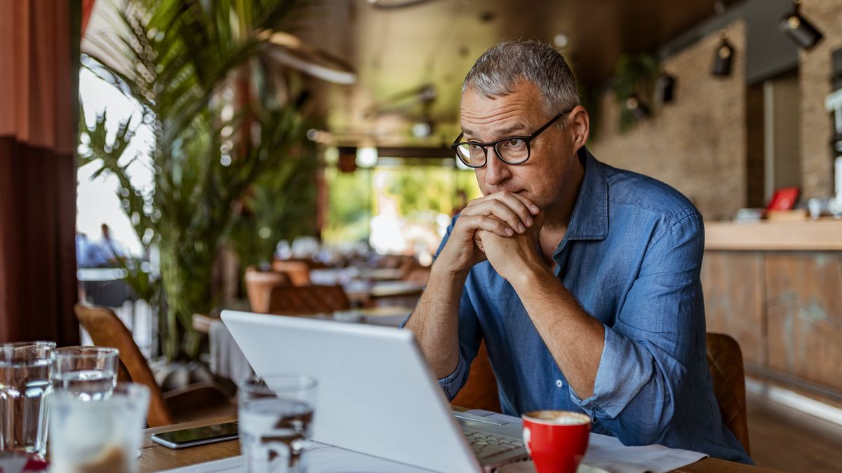 Man reading Northwestern Mutual’s Weekly Market Commentary