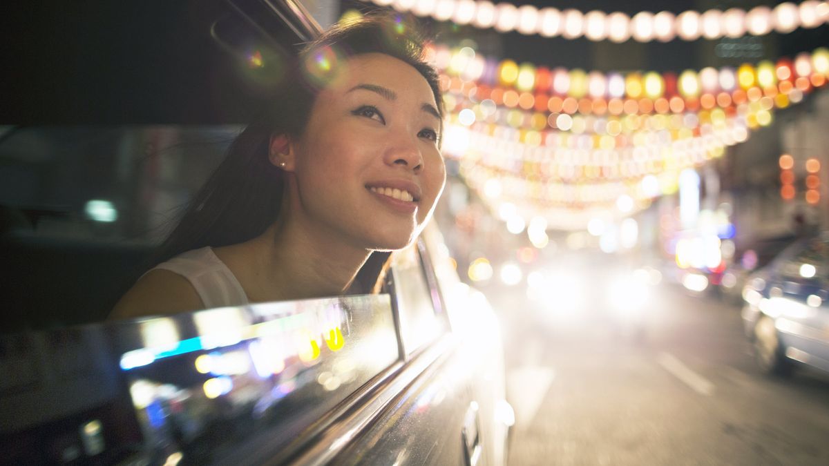 Woman thinking about how to invest $100,000.