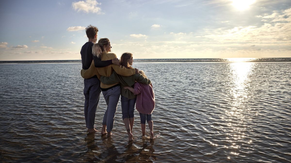 Family looking out into the ocean