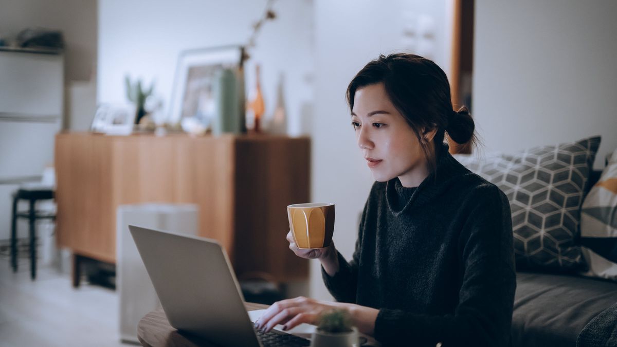 Woman drinking coffee and learning about 401(k) tax 