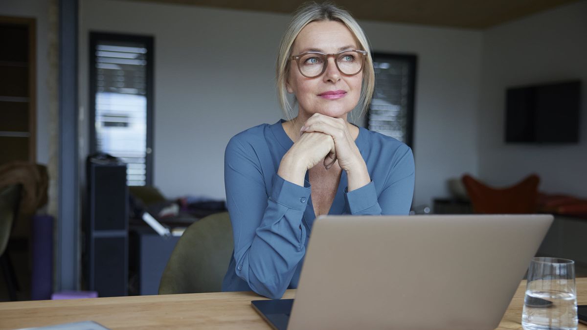 Woman thinking about earning high yields on investment-grade bonds