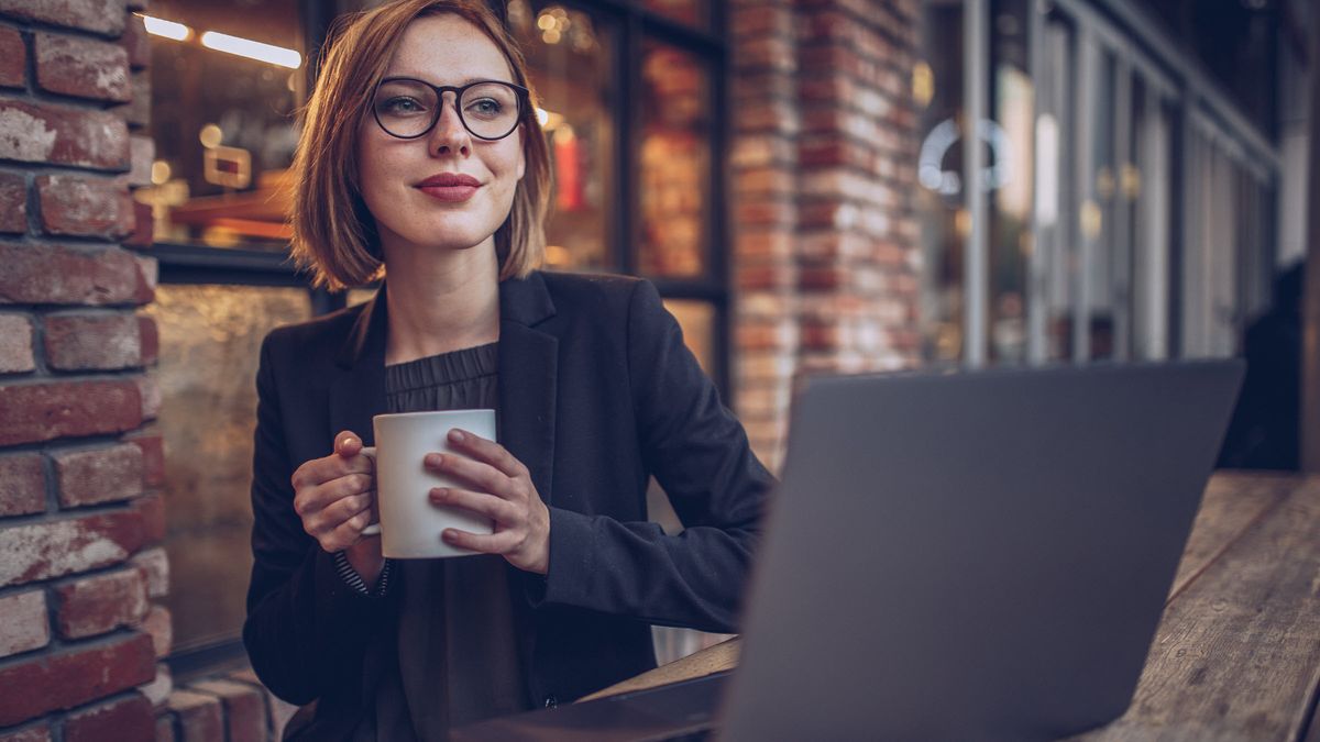 Woman thinking about what she read in Northwestern Mutual’s weekly market commentary.