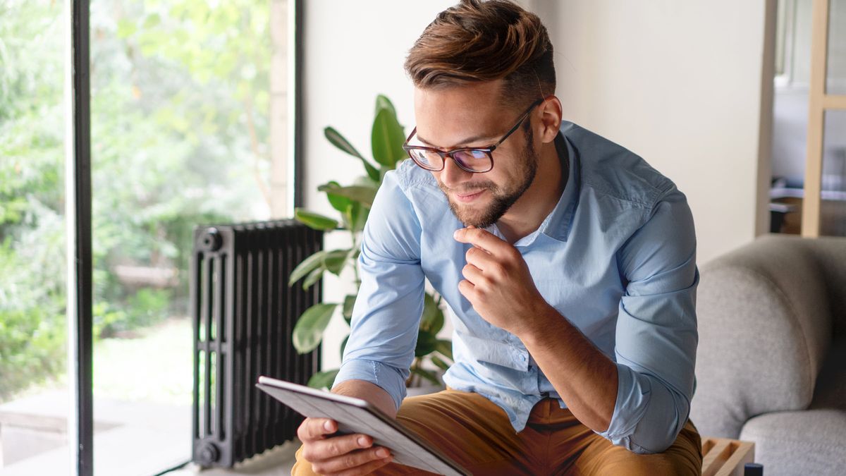 Man reading article form Northwestern Mutual about the importance of investing in quality companies.