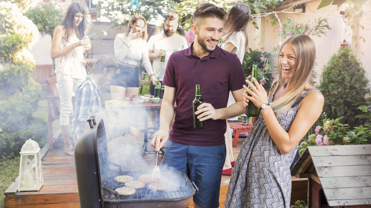 Couple at a backyard barbeque