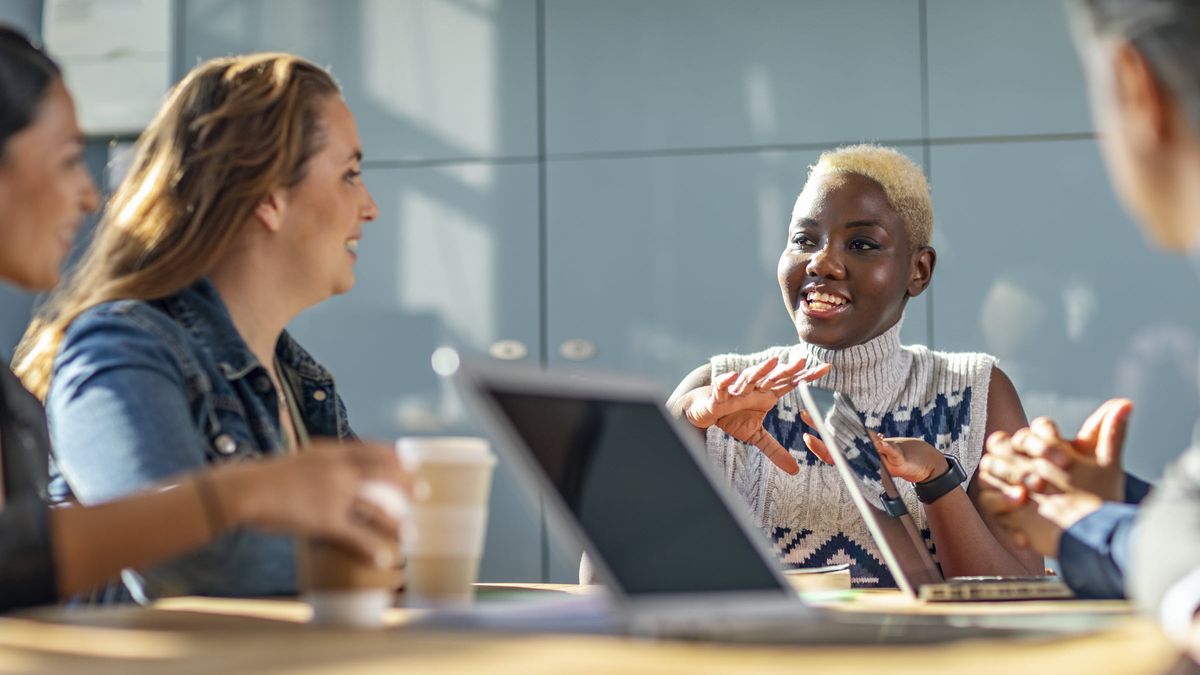 women sitting at a conference table