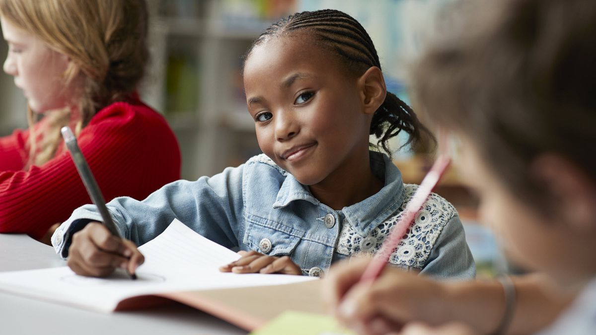 Girl in a classroom.