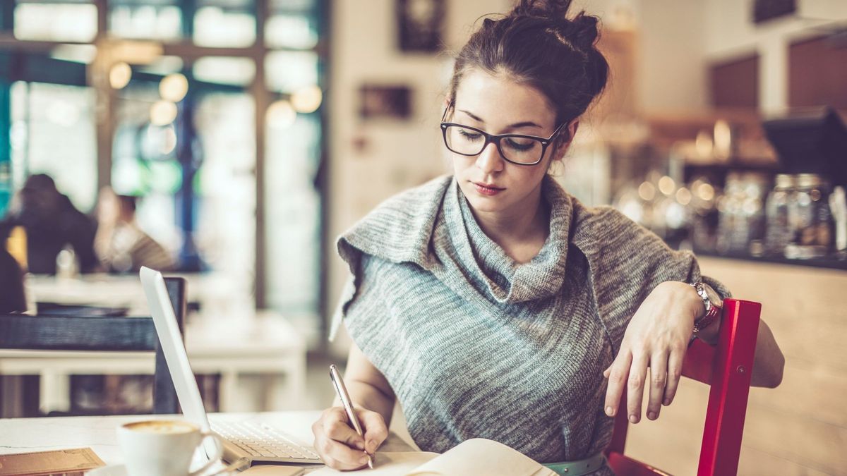 Woman working in a cafe