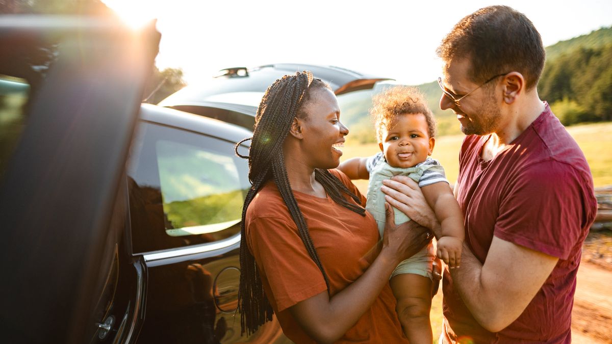 Young couple and baby enjoying the outdoors and financial freedom thanks to a solid financial plan with Northwestern Mutual.