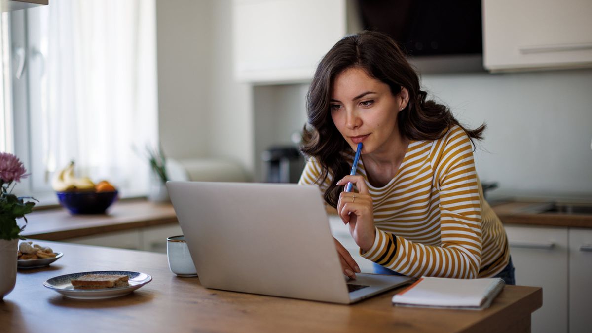 Woman reading about Bitcoin ETPs from Northwestern Mutual Wealth Management Company