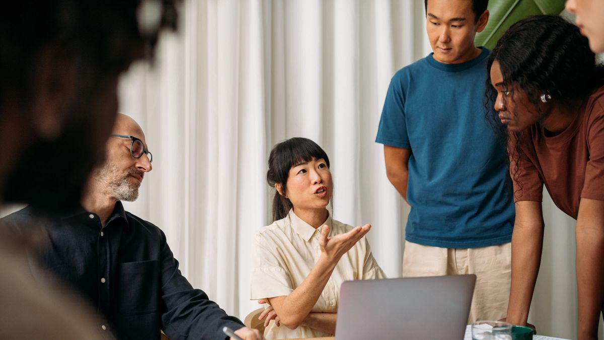 Co-workers discuss the shift in market leadership beyond technology and into other economic sectors.