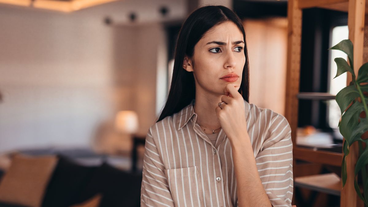 Woman thinking through a decision.