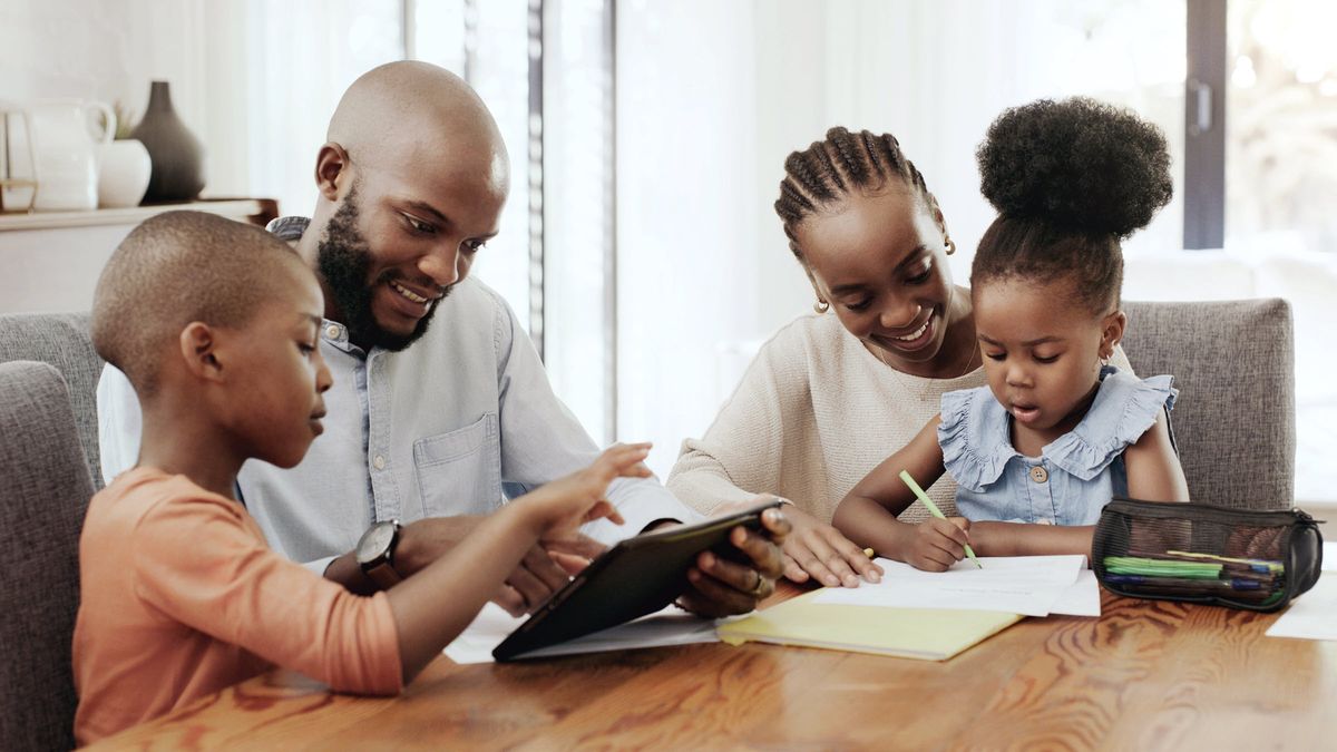 A family enjoys time together at the dining table.