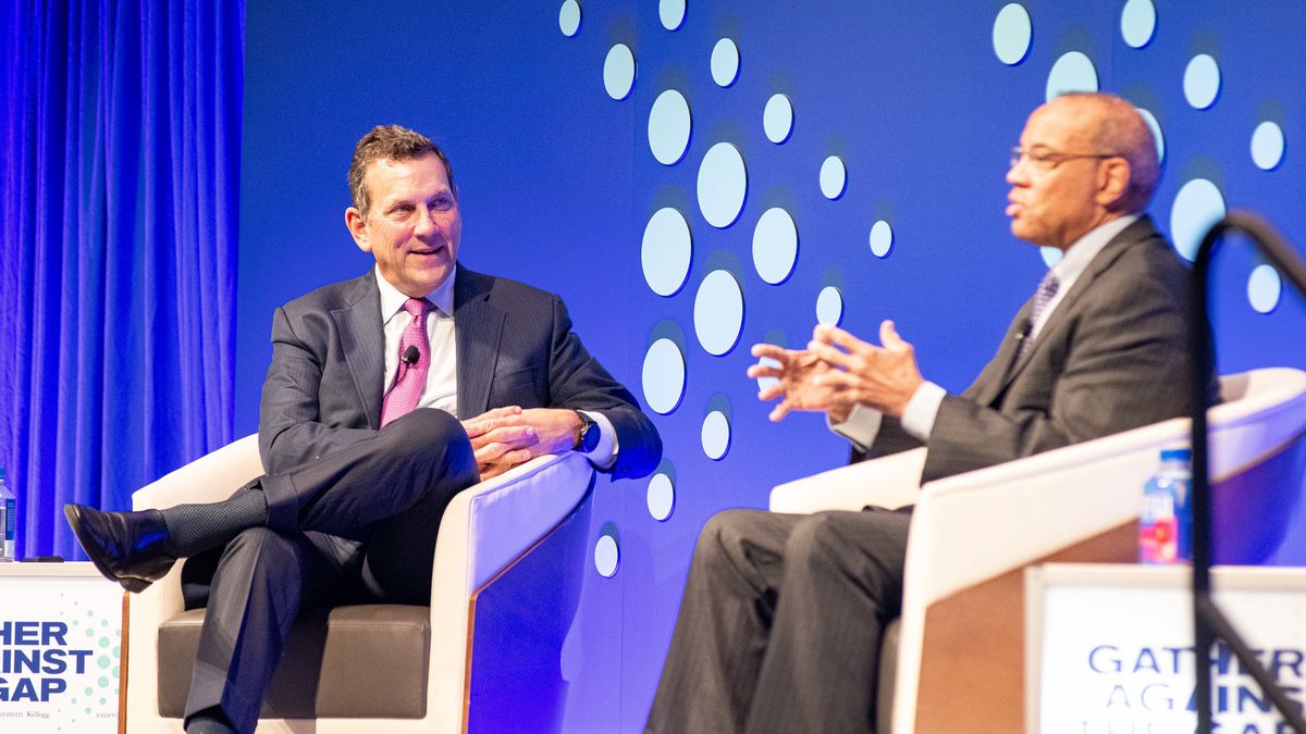 Northwestern Mutual Chairman, President and CEO, John Schlifske (left) with John W. Rogers Jr (right)., Co-CEO of Ariel Investments, on stage at the first-ever Gather Against the Gap event in Milwaukee.