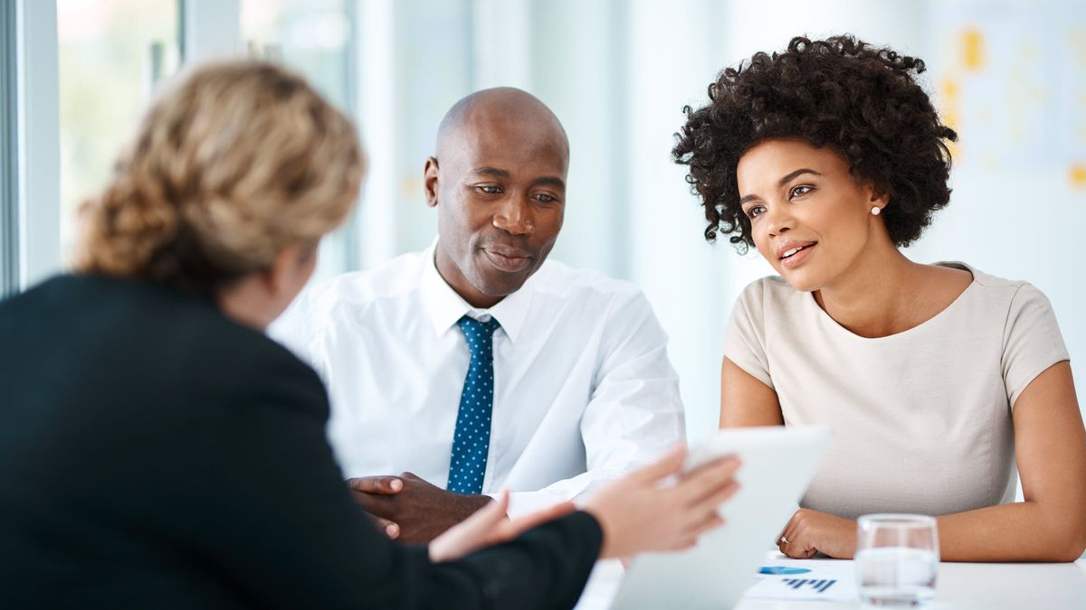 Couple discussing their financial plan with a Northwestern Mutual Advisor.