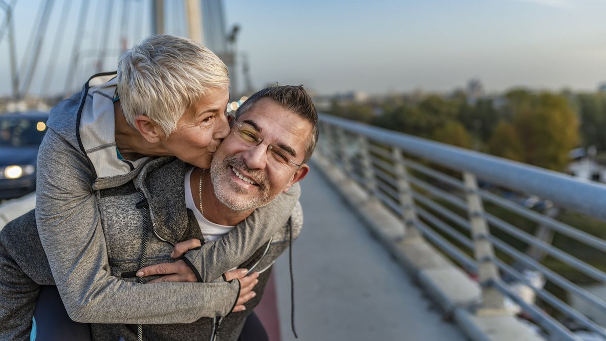 Happy retired couple embracing