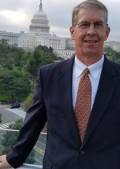 Professional headshot of financial representative, Bruce J Pope.