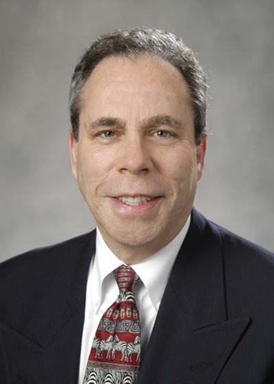 Professional headshot of financial representative, Isaac Shainblum.