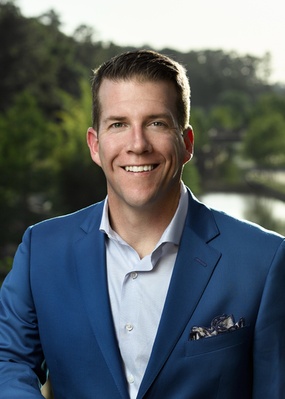 Professional headshot of financial representative, Devin Greer.