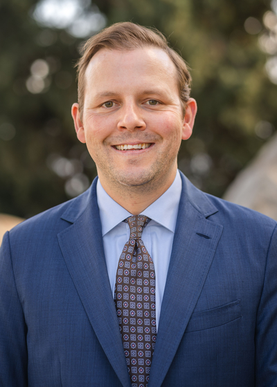 Justin  Scholey 