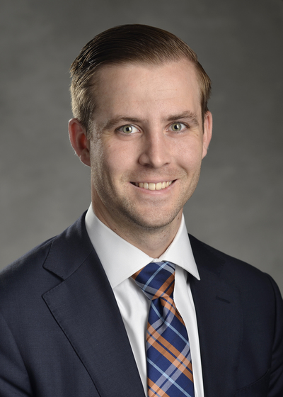 Eric J Tinnell