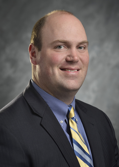 Professional headshot of financial representative, Joseph E Schumaker.