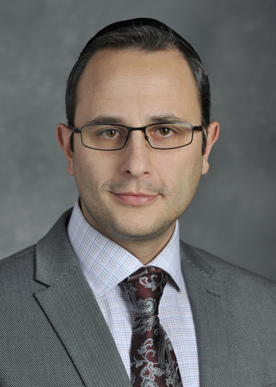 Professional headshot of financial representative, Isaac Amran.
