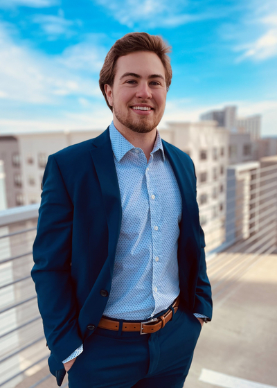 Professional headshot of financial representative, Corbin Watson.