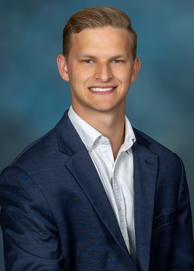 Professional headshot of financial representative, James Reed.