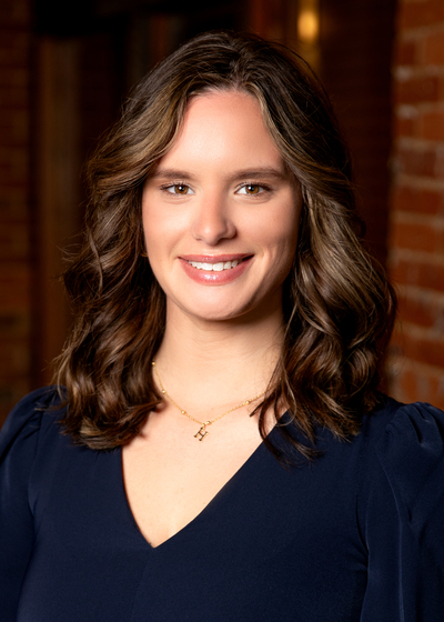 Photo of Director of Operations and Client Service Hailey Camille Smith