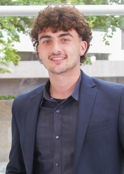 Professional headshot of financial representative, Trevor Dalbec.