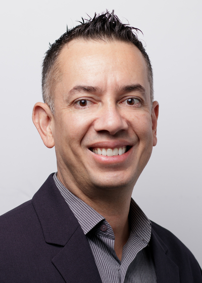 Professional headshot of financial representative, Wilfredo Dominguez.