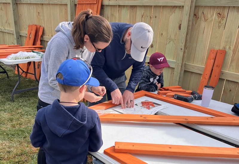 Virginia Beach office building a play set for a family in need 