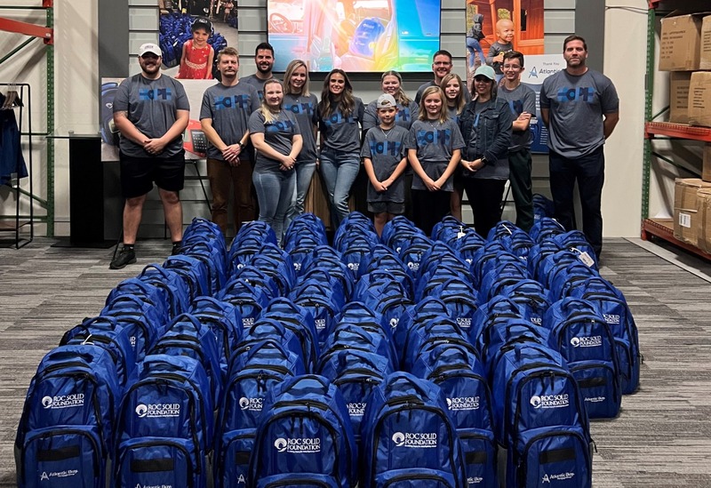 Virginia Beach office putting together school bags for those in need 