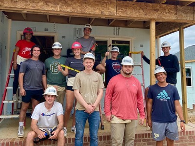 Josh and Kurt with the Intern team on site with the Wake County Habitat for Humanity