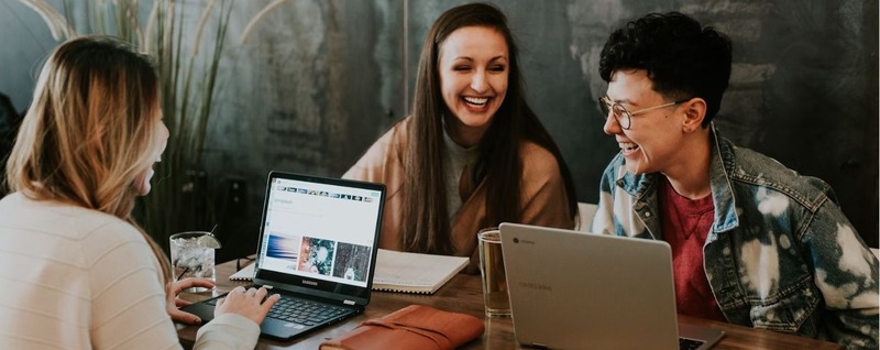 Women working and laughing