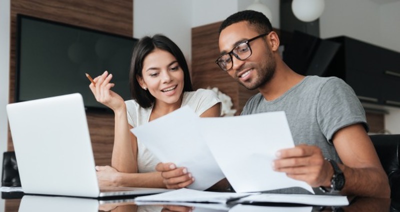 Couple looking at their financial plan