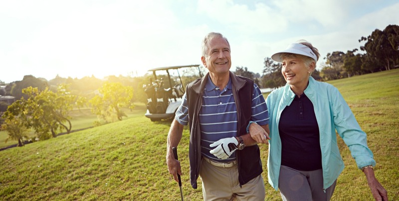 couple golfing