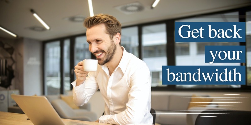 Text: Get back your bandwidth. Software engineer smiling at laptop because he feels financially secure.