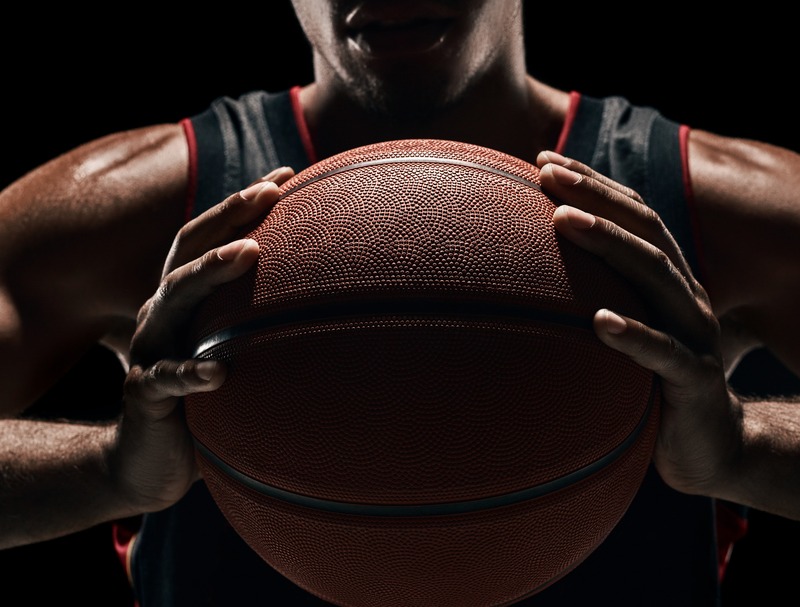 Player Holding a Basketball 
