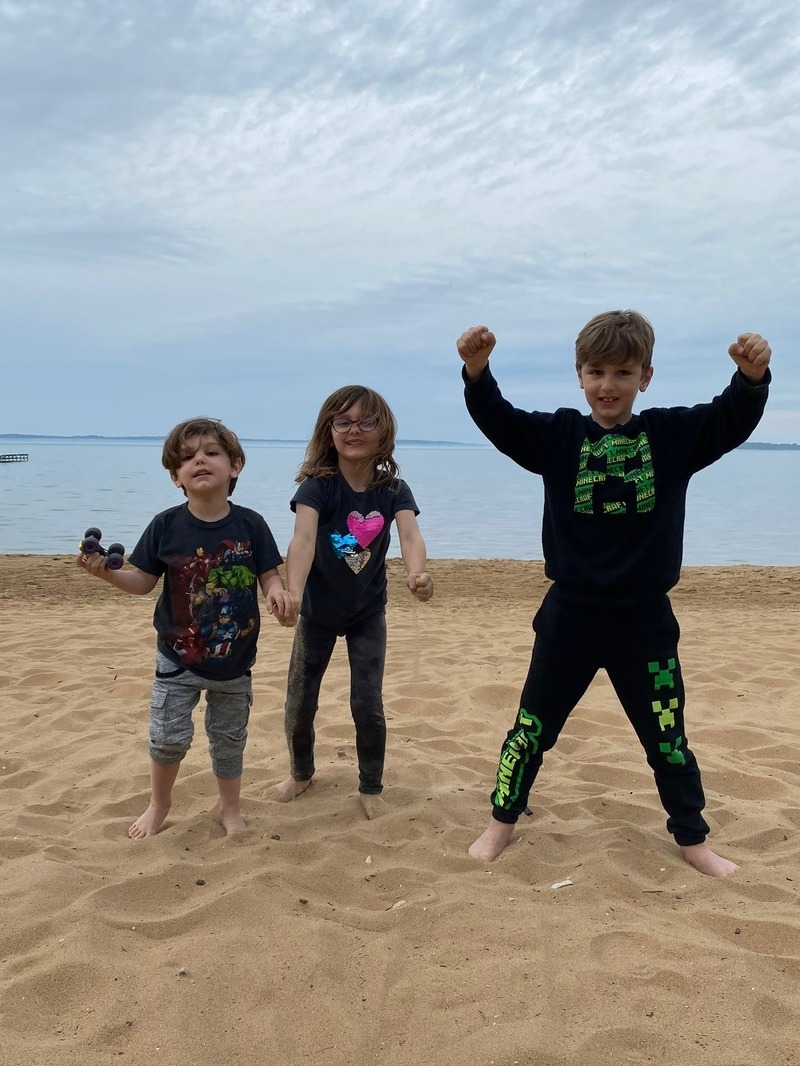 Steven Kuza children playing on Michigan beach