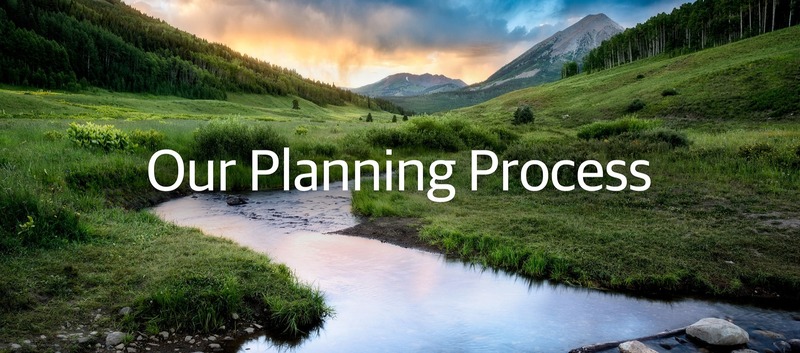 Our Planning Process. River winding through mountains.