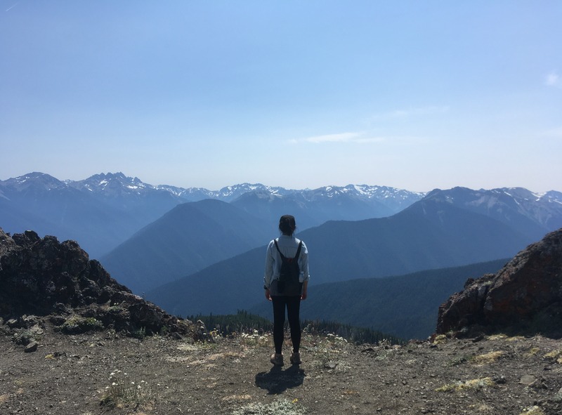 female asian advisor hiking