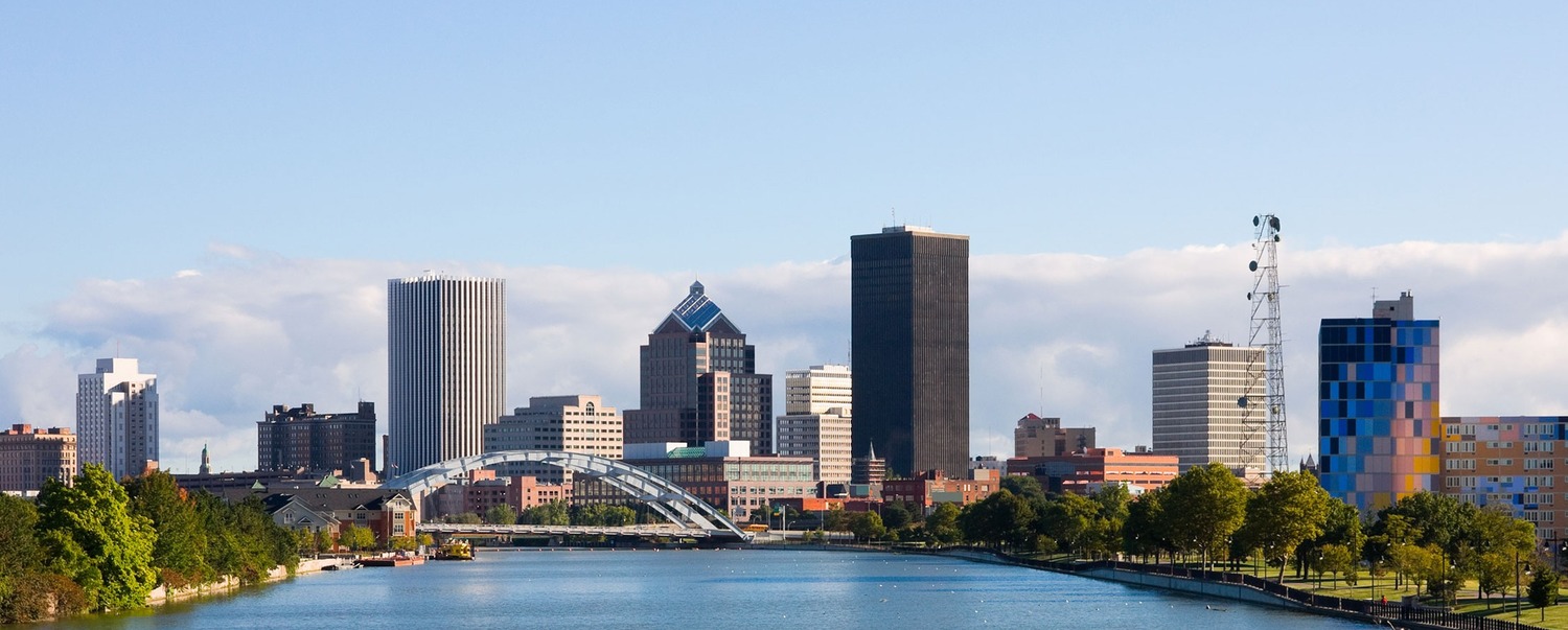 Skyscrapers next to a river in Rochester