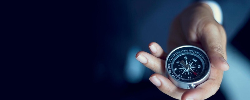 Businessman with Compass