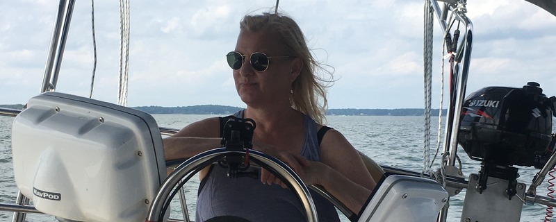 at the helm
