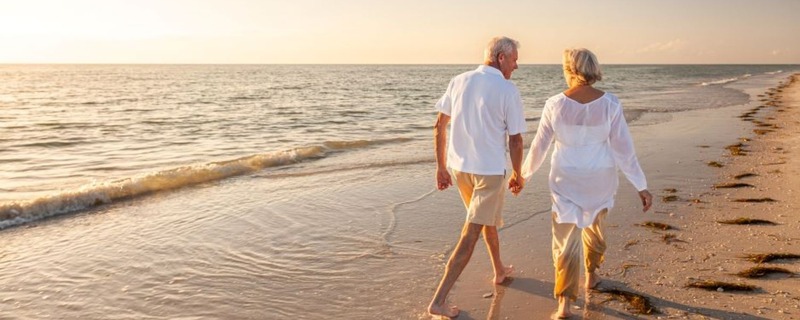 Couple walking on beach